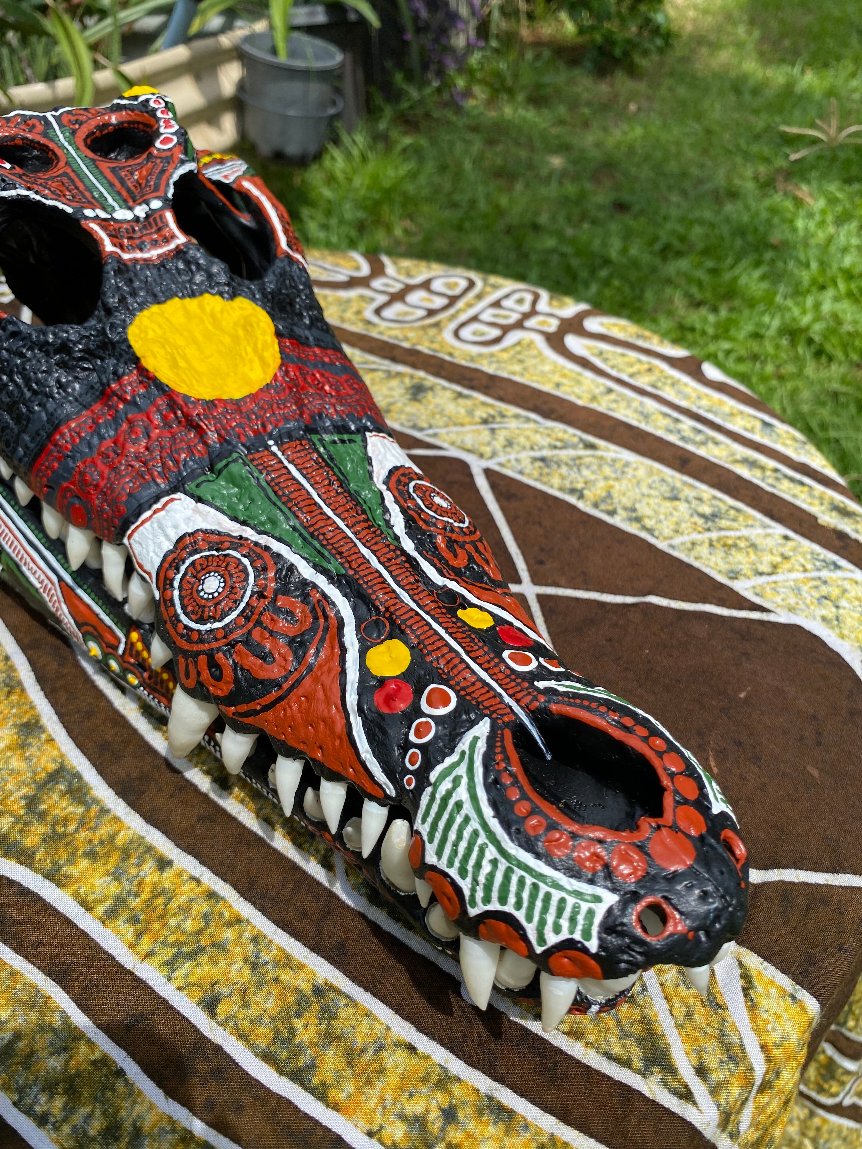 Commission Crocodile Skull; Aboriginal Flag